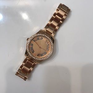 gold watch with diamond rim